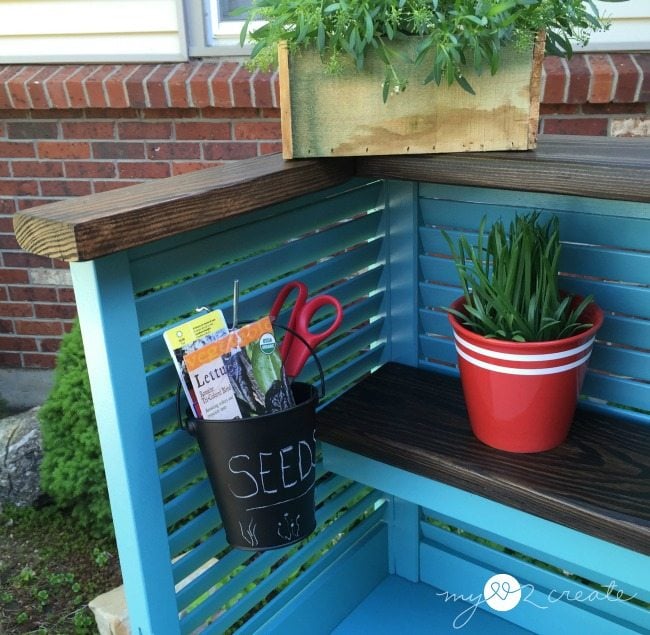 dollar bucket to hold supplies on potting bench shudders